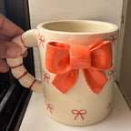 Beautiful Crafted Orange And Red Bow Mug
