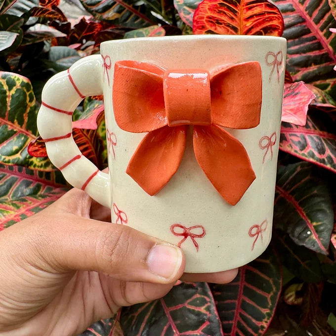 Beautiful Crafted Orange And Red Bow Mug