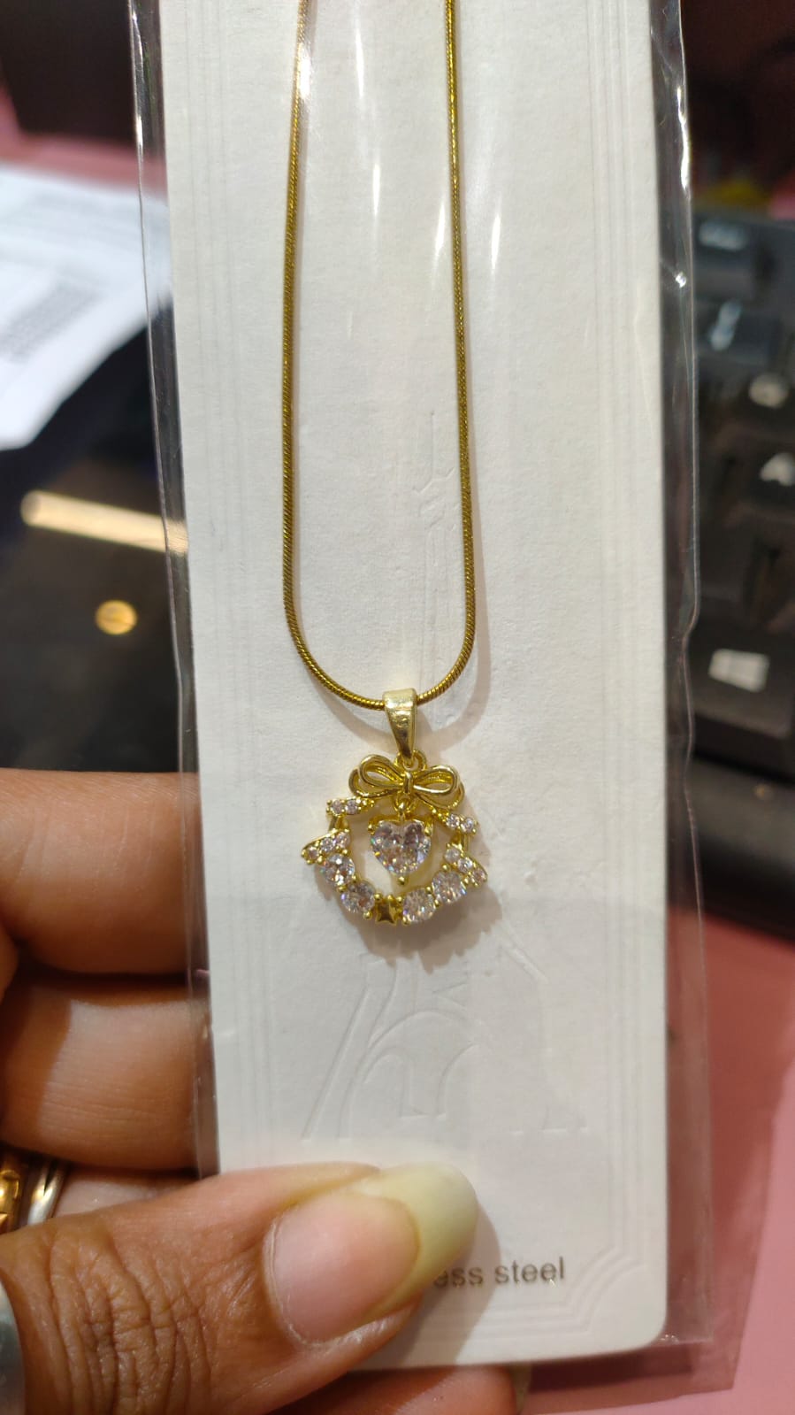 SMALL HEART WITH BOW NECKLACE