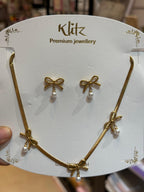 Elegant Bow with Pearl necklace